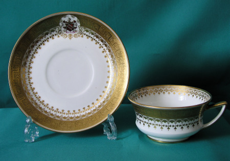 A Davenport Armorial tea cup and saucer c.1870