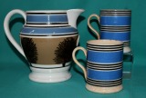 A pair of pearlware mocha decoration mugs c.1820