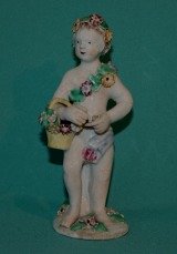 A Bow Porcelain Figure of Putto c.1765